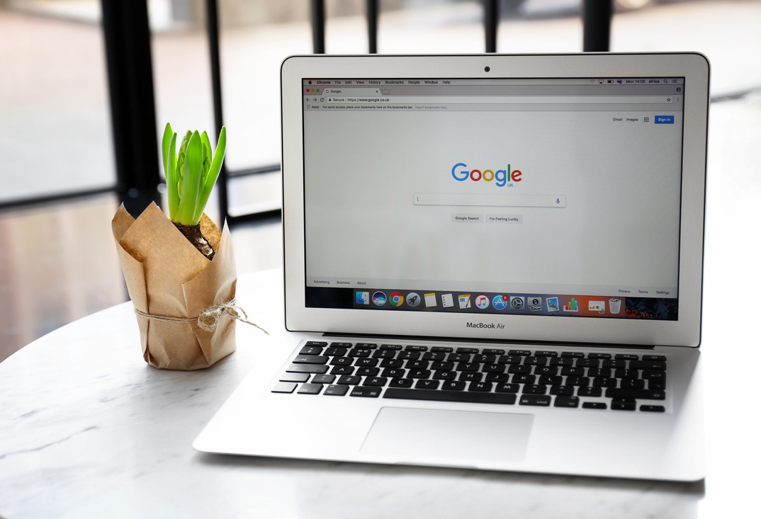 Apple Macbook Air Displaying Google Search Page on Screen